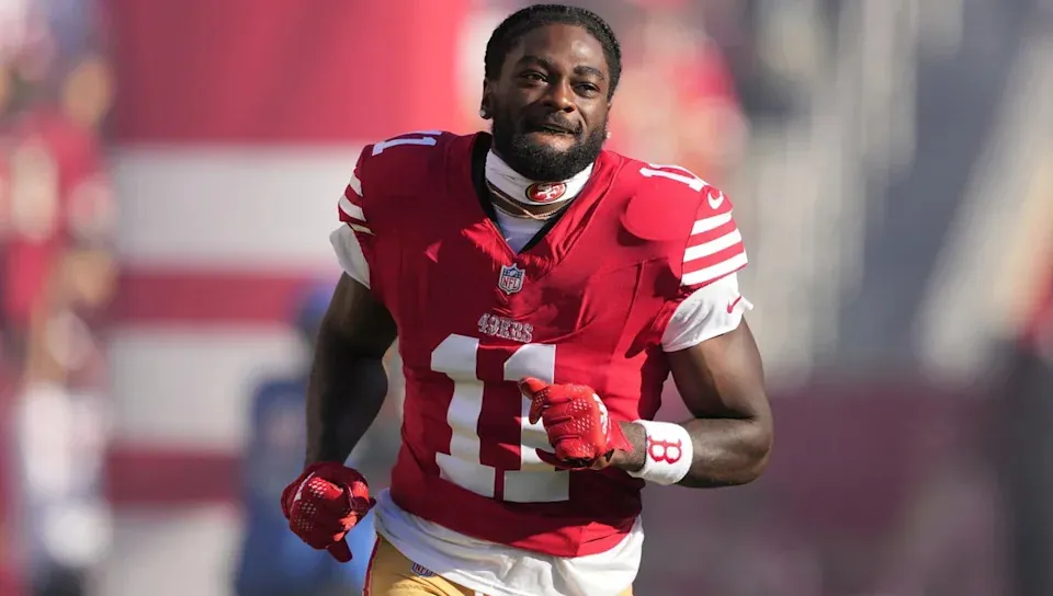Sep 9, 2024; Santa Clara, California, USA; San Francisco 49ers wide receiver Brandon Aiyuk (11) is introduced to the crowd before the game against the New York Jets at Levi’s Stadium. Mandatory Credit: Darren Yamashita-Imagn Images