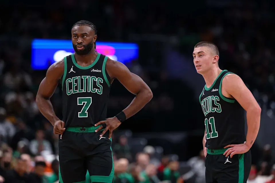 Jaylen Brown #7 and Payton Pritchard #11 of the Boston Celtics look on after a play against the Washington Wizards during the second half at Capital One Arena on October 24, 2024 in Washington, DC. (Photo by Scott Taetsch/Getty Images)