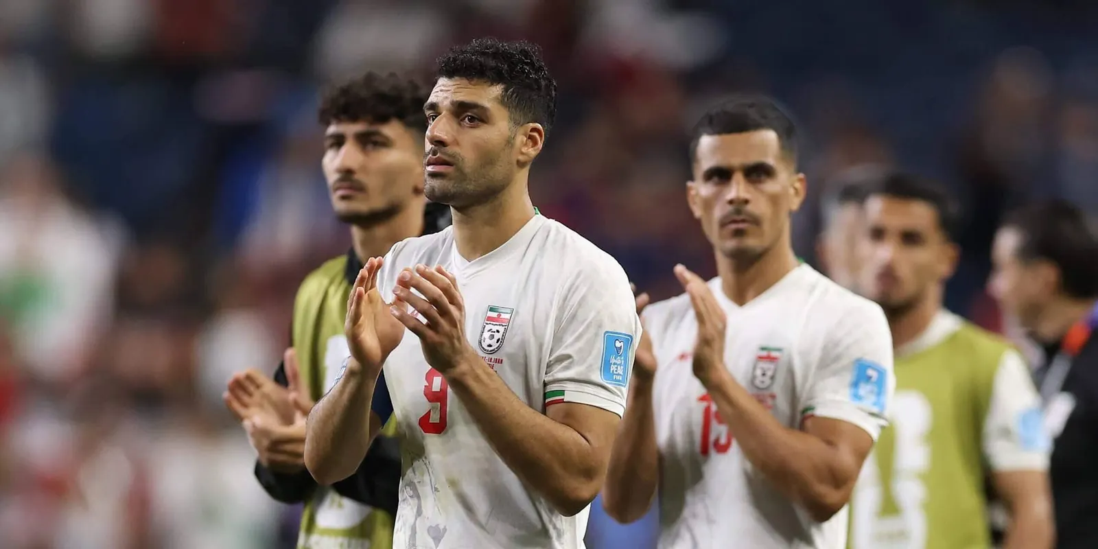 Mehdi Taremi and his Iran team-mates applaud supporters after their 1-1 draw against Egypt in Seattle
