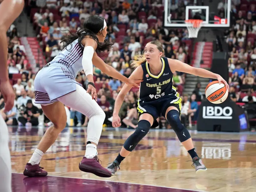 WNBA regular-season record crowd of 20,996 watch Wings beat Tempo