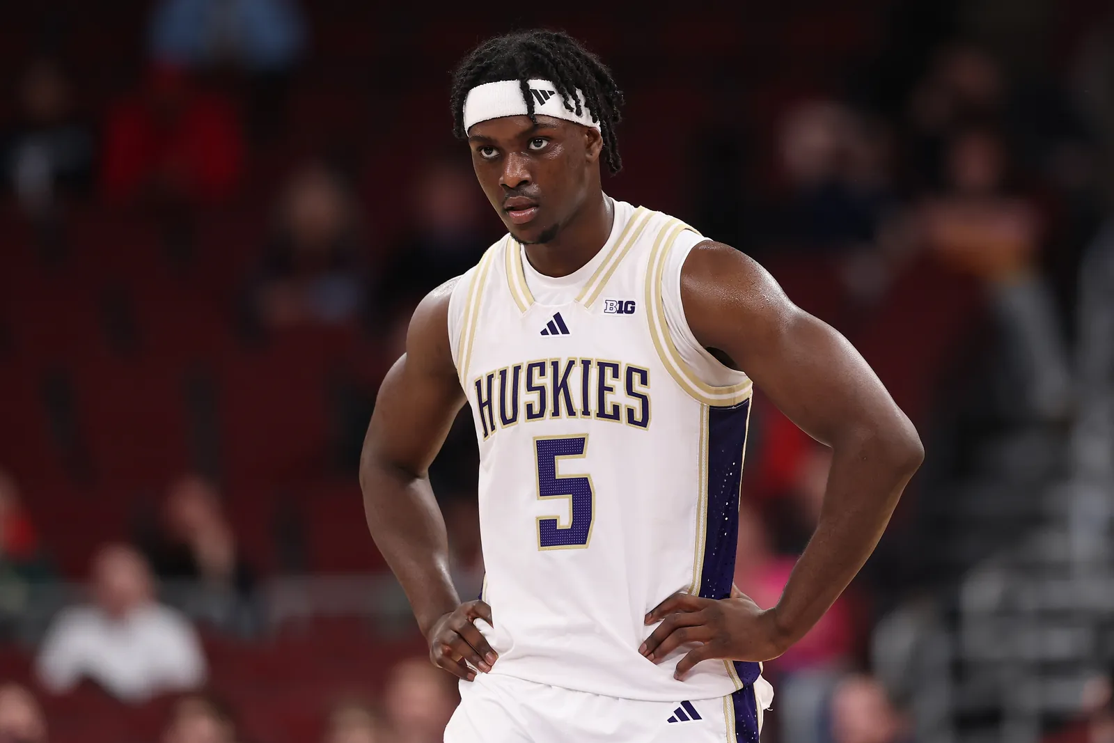 Zoom Diallo stands on the court for the Washington Huskies during a 2026 NCAA game vs. the USC Trojans