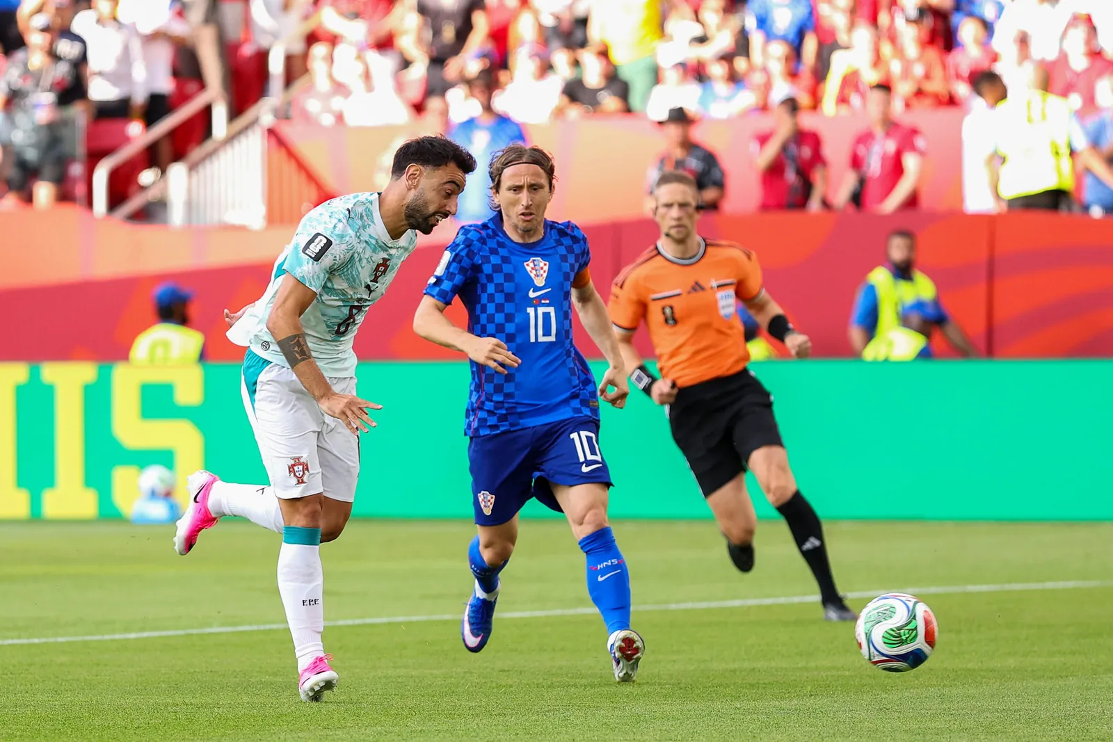 Bruno Fernandes #8 of Portugal and Luka Modric #10 of Croatia compete for the ball during the Portugal v Croatia match.
