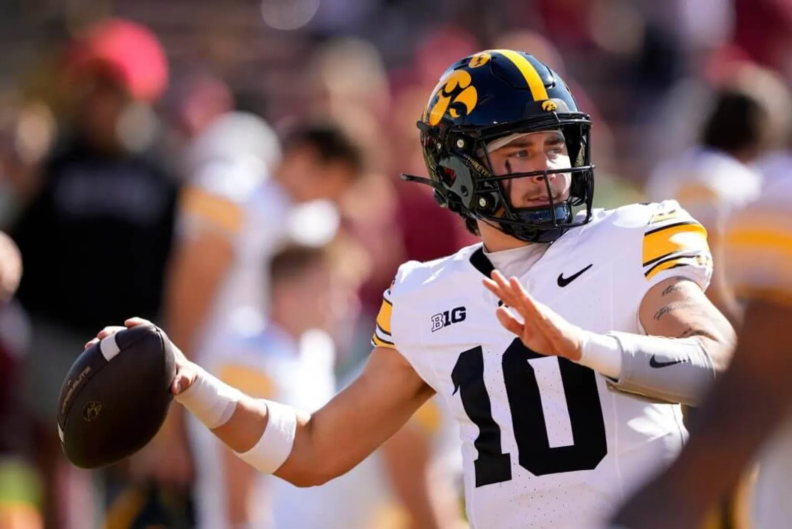 Iowa quarterback Jeremy Hecklinski warms up before a game against Iowa State.