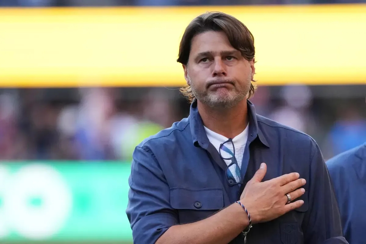 U.S. coach Mauricio Pochettino acknowledges supporters after the World Cup round of 16 match between the U.S. and Belgium.