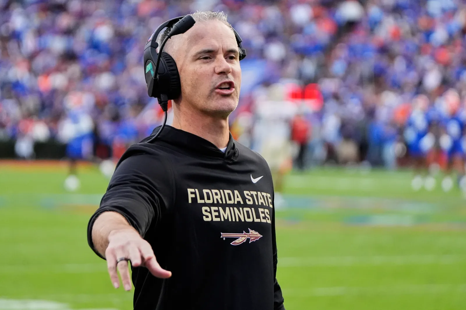 Florida State head coach Mike Norvell has words with an official during the first half of an NCAA college football game against Florida, Saturday, Nov. 29, 2025, in Gainesville, Fla. (AP Photo/John Raoux, file)